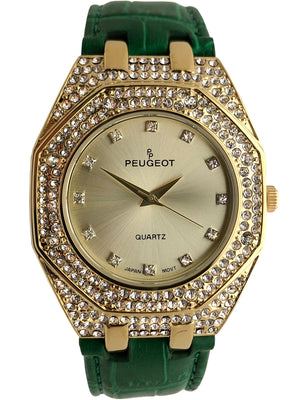 Women 37mm Boyfriend watch with gold trim and crystal bezel and crystal hour markers on a gold face paired with a Green leather band